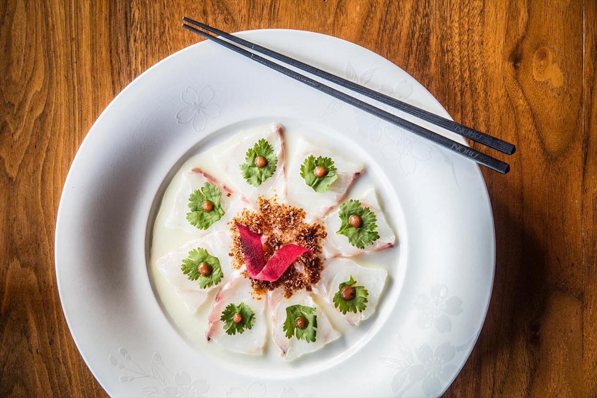 Hotel Crown Towers Sydney Exterior foto A plate of fish sashimi